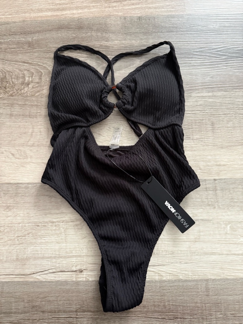 Fashion Nova Black Textured One-Piece with Ring Cutout